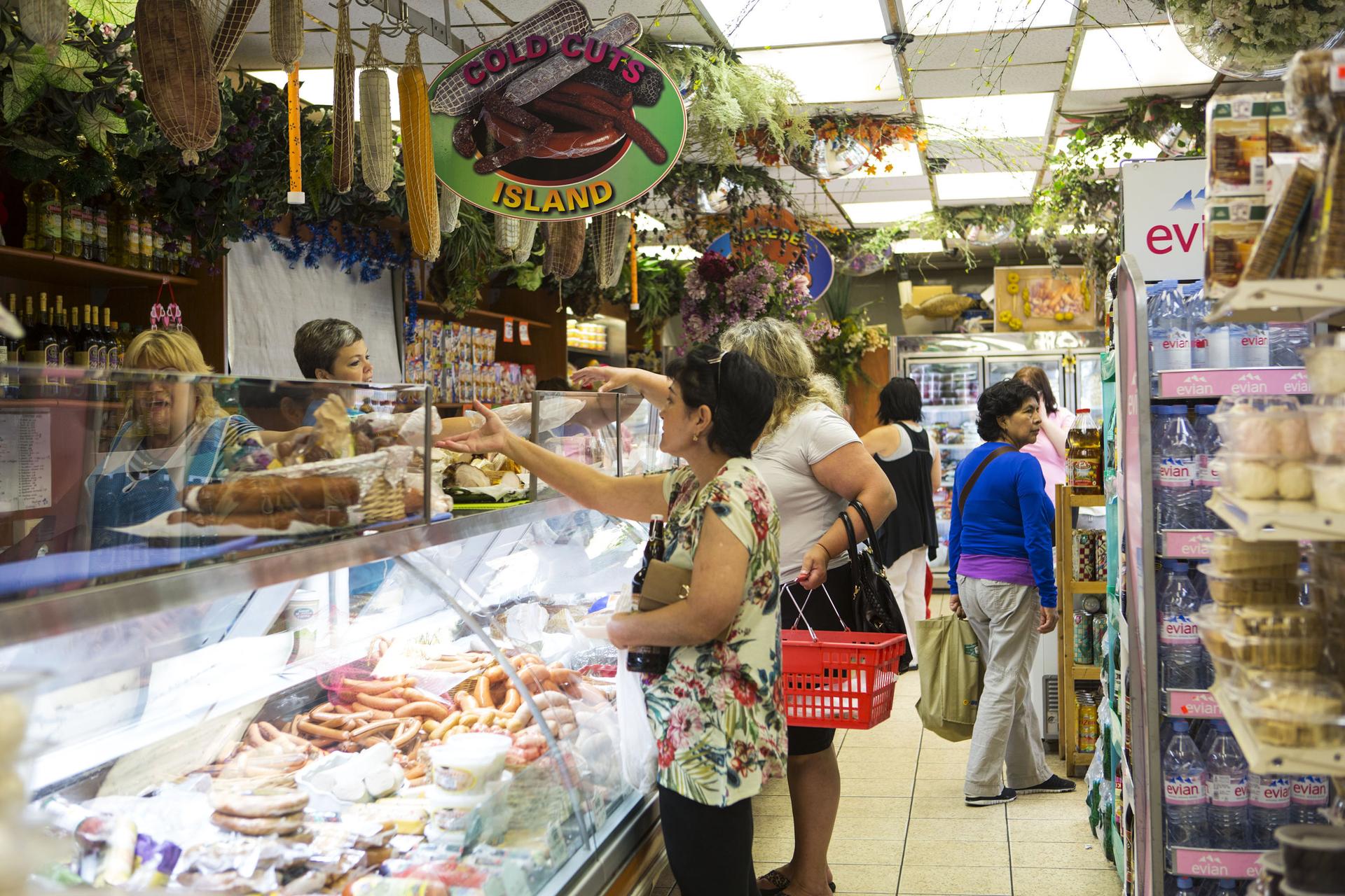 shoppers inside Gold Label International Food in Brighton Beach