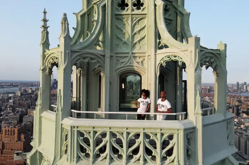 Ailey's Jacqueline Green and Yannick Lebrun on top of The Woolworth Building. Photo: Mikey Pozarik