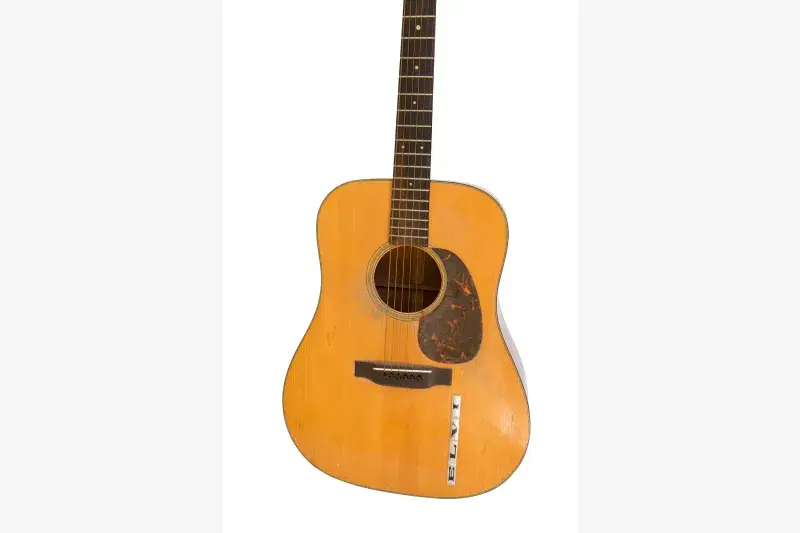 Model D-18 acoustic guitar, C.F. Martin & Co. (1942) Collection of Michael and Barbara Malone. Photo: Courtesy, Jules Frazier

